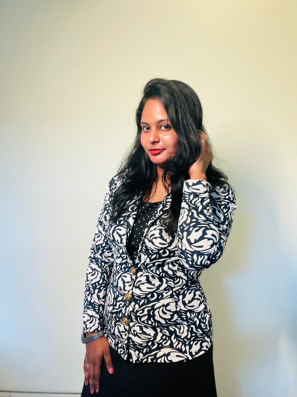 Portrait of Kalaipriya R K, founder and lead makeup artist at Sherlyn Seven